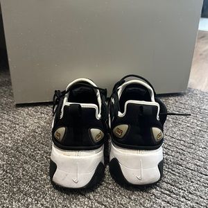 Nike Zoom 2K white and black. Slightly worn but with cleaning looks brand new.
